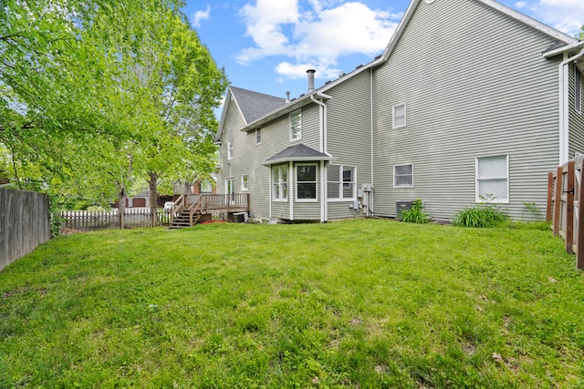 rear view of property with a deck
