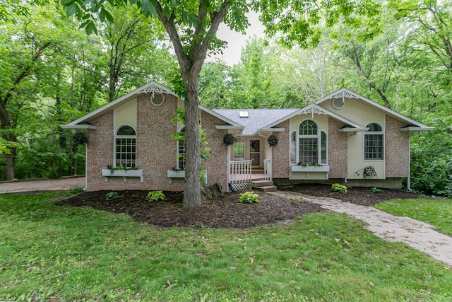 2105 Oak Point Ct, Columbia, MO 65203 - ranch-style house with a front yard and brick siding