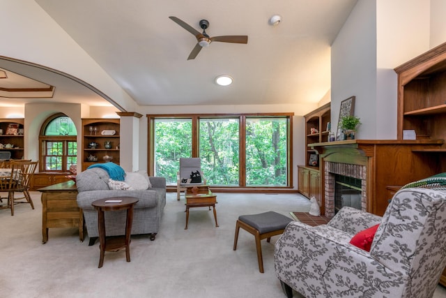 2105 Oak Point Ct, Columbia, MO 65203 - living area featuring ceiling fan, a fireplace, light carpet, and lofted ceiling