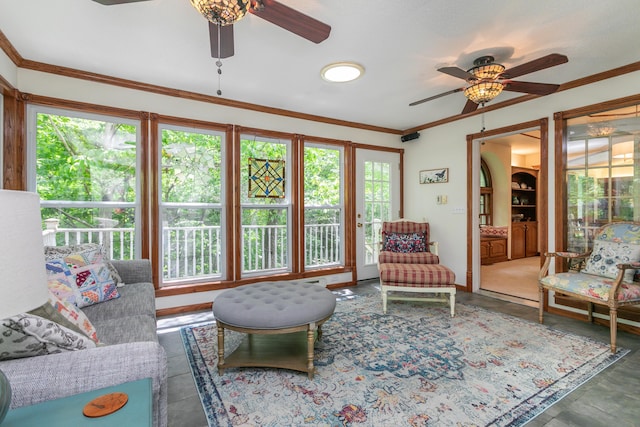 2105 Oak Point Ct, Columbia, MO 65203 - living room featuring ceiling fan and crown molding