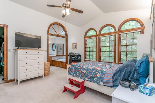 2105 Oak Point Ct, Columbia, MO 65203 - bedroom with vaulted ceiling, light colored carpet, connected bathroom, and a ceiling fan
