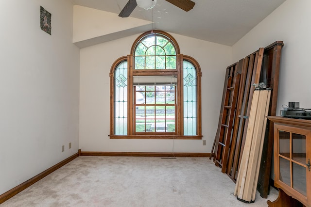 2105 Oak Point Ct, Columbia, MO 65203 - empty room with ceiling fan, vaulted ceiling, carpet, and baseboards
