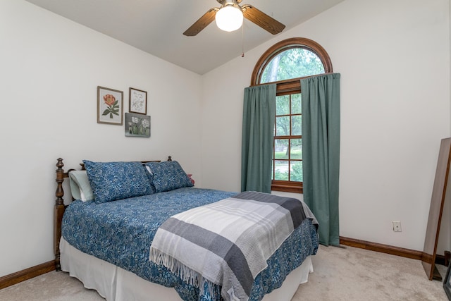 2105 Oak Point Ct, Columbia, MO 65203 - bedroom featuring vaulted ceiling, light colored carpet, baseboards, and ceiling fan