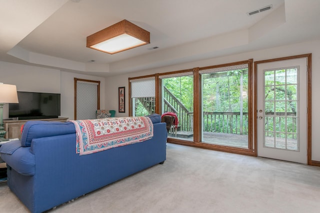 2105 Oak Point Ct, Columbia, MO 65203 - carpeted living area featuring a raised ceiling