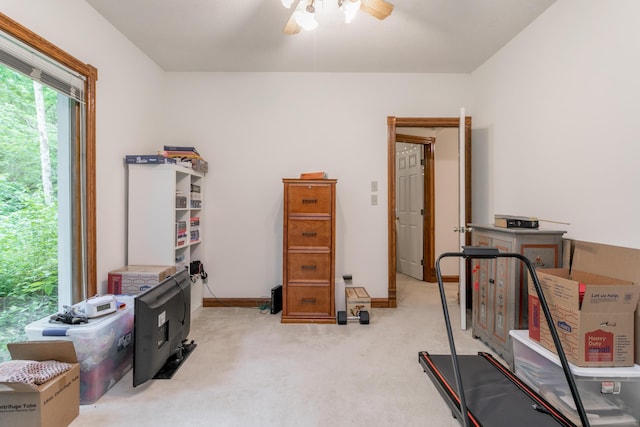 2105 Oak Point Ct, Columbia, MO 65203 - workout area with ceiling fan, light colored carpet, and baseboards