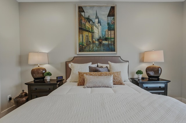 bedroom featuring baseboards