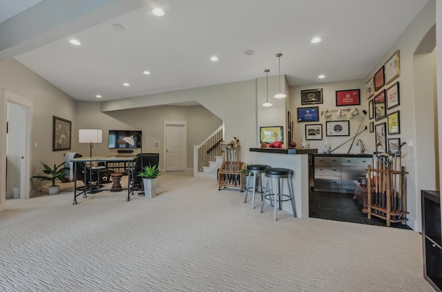 bar area featuring recessed lighting, arched walkways, stairs, carpet floors, and hanging light fixtures