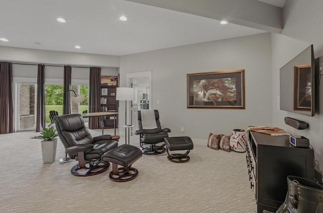 living area with carpet floors, recessed lighting, and baseboards