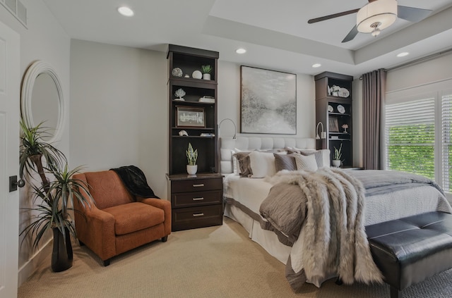 bedroom featuring recessed lighting, light carpet, and a ceiling fan