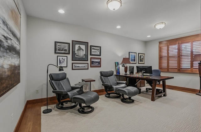 office area with baseboards, wood finished floors, and recessed lighting
