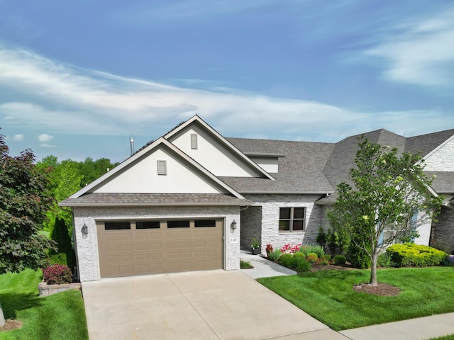 view of front of house featuring driveway, a front lawn, stucco siding, a garage, and stone siding