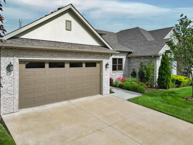 view of front of house with roof with shingles, driveway, an attached garage, and brick siding