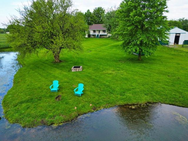 view of subject property featuring a nearby body of water