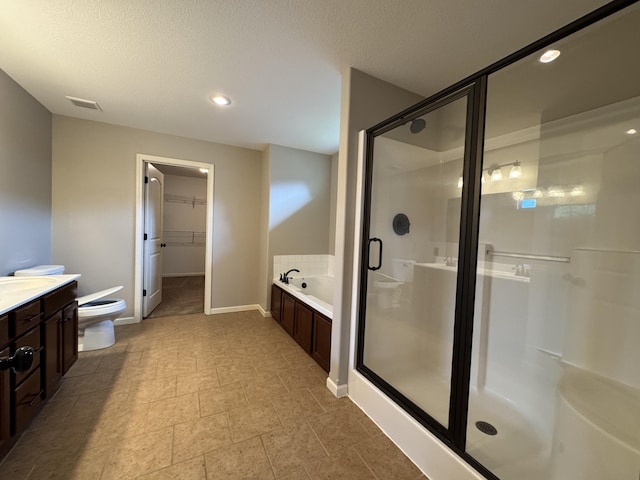 full bath with toilet, a garden tub, a stall shower, vanity, and baseboards