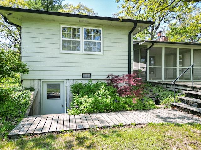 10155 E Union Church Rd, Centralia, MO 65240 - view of side of home featuring a sunroom and a chimney