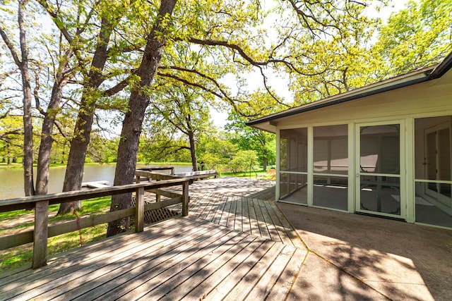 10155 E Union Church Rd, Centralia, MO 65240 - deck featuring a water view, a sunroom, and view of wooded area