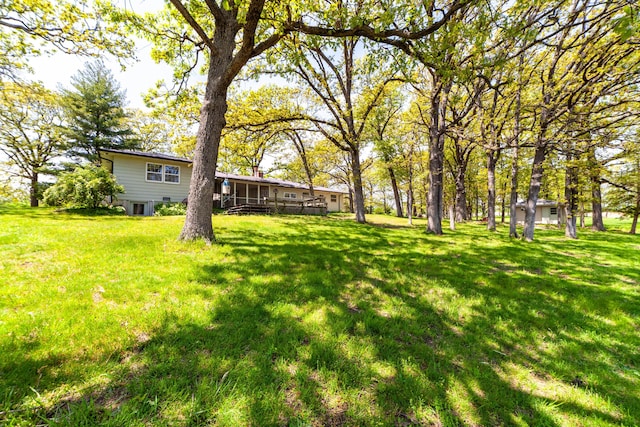 10155 E Union Church Rd, Centralia, MO 65240 - view of green lawn featuring a sunroom