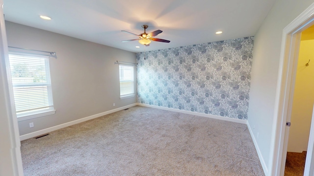 5492 Diversey Rdg, Columbia, MO 65203 - unfurnished room featuring ceiling fan, carpet flooring, recessed lighting, and wallpapered walls