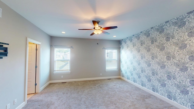 5492 Diversey Rdg, Columbia, MO 65203 - unfurnished room with plenty of natural light, ceiling fan, carpet flooring, recessed lighting, and wallpapered walls