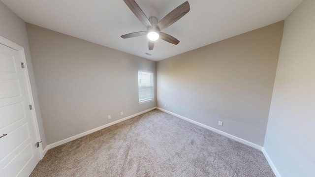 5492 Diversey Rdg, Columbia, MO 65203 - carpeted spare room featuring ceiling fan and baseboards