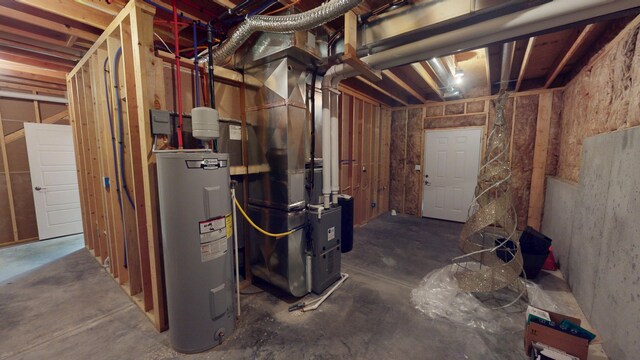 5492 Diversey Rdg, Columbia, MO 65203 - unfinished below grade area featuring water heater and heating unit