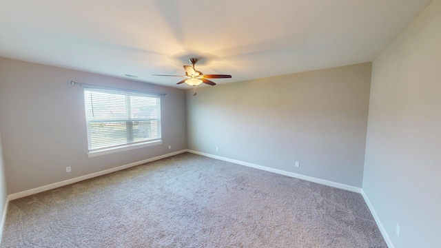 5492 Diversey Rdg, Columbia, MO 65203 - carpeted empty room with ceiling fan and baseboards