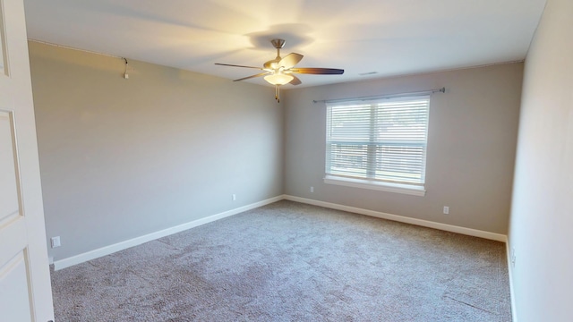 5492 Diversey Rdg, Columbia, MO 65203 - carpeted empty room featuring ceiling fan and baseboards