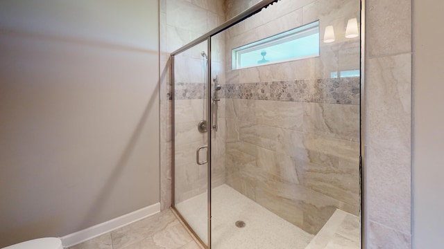 5492 Diversey Rdg, Columbia, MO 65203 - bathroom featuring a shower stall and baseboards