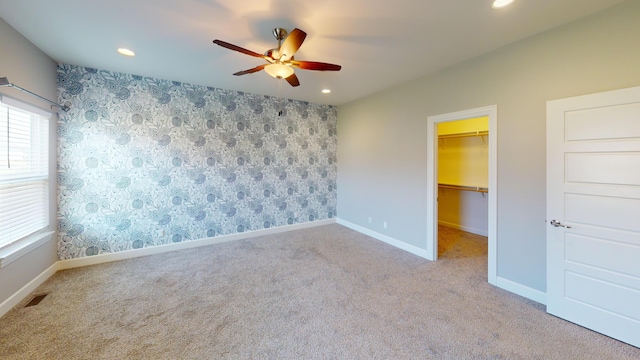 5492 Diversey Rdg, Columbia, MO 65203 - unfurnished bedroom featuring carpet floors, multiple windows, a spacious closet, recessed lighting, and a closet