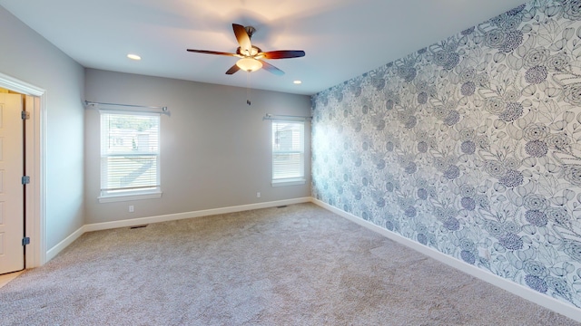 5492 Diversey Rdg, Columbia, MO 65203 - carpeted empty room featuring ceiling fan, wallpapered walls, and recessed lighting