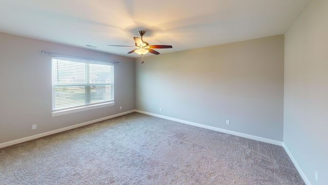 5492 Diversey Rdg, Columbia, MO 65203 - carpeted spare room featuring ceiling fan and baseboards