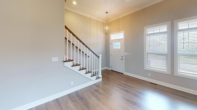 5492 Diversey Rdg, Columbia, MO 65203 - entryway featuring crown molding, stairs, wood finished floors, a chandelier, and recessed lighting