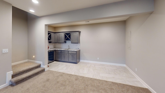 5492 Diversey Rdg, Columbia, MO 65203 - bar area featuring light colored carpet, recessed lighting, backsplash, and stairs