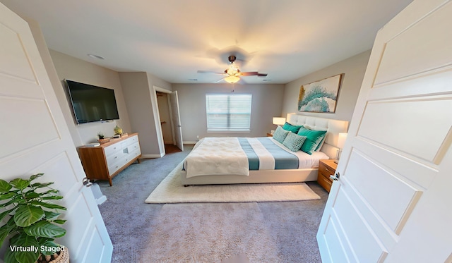 5492 Diversey Rdg, Columbia, MO 65203 - bedroom with light colored carpet and a ceiling fan
