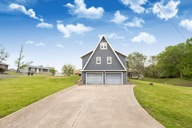 garage featuring concrete driveway
