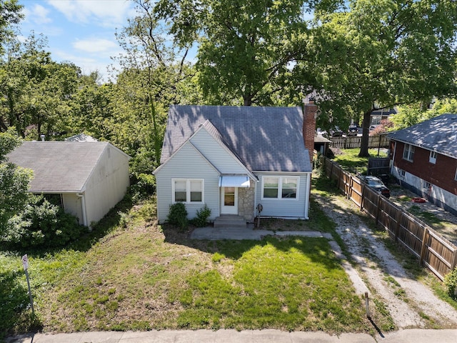 view of front of property featuring a chimney