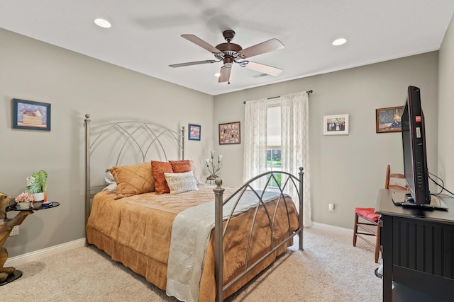 bedroom with light carpet, baseboards, recessed lighting, and a ceiling fan