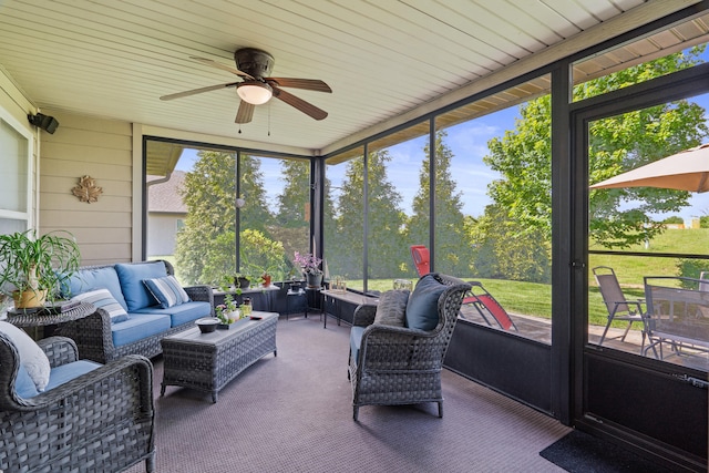 sunroom with an outdoor hangout area and ceiling fan