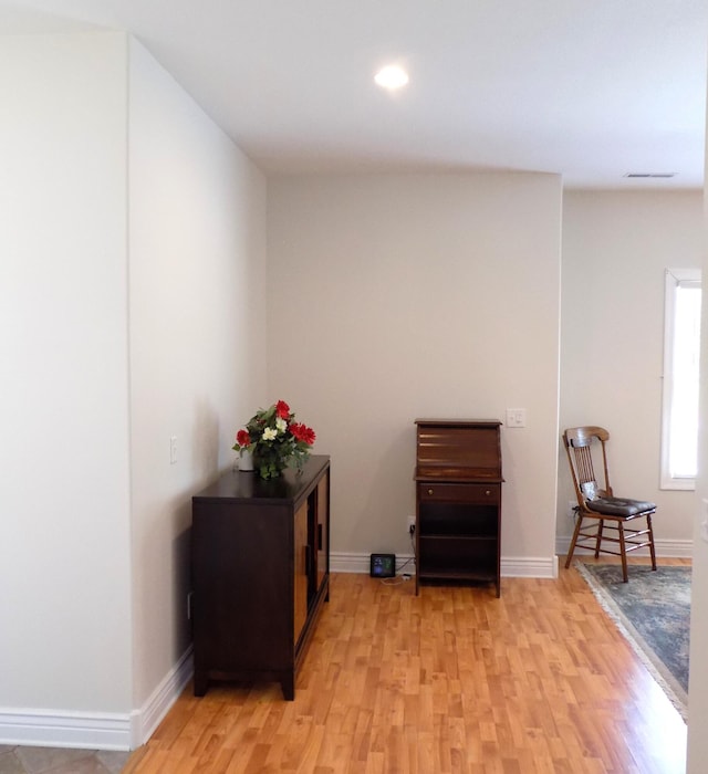 320 S Jefferson St, Centralia, MO 65240 - living area featuring light wood-style floors, baseboards, and recessed lighting