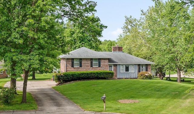 4 Halley Ct, Fulton, MO 65251 - split level home featuring brick siding, driveway, a front lawn, a chimney, and a shingled roof