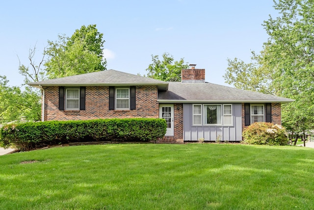 4 Halley Ct, Fulton, MO 65251 - view of front of home featuring a front yard, board and batten siding, brick siding, a chimney, and roof with shingles