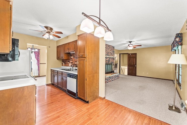 4 Halley Ct, Fulton, MO 65251 - kitchen with a ceiling fan, dishwashing machine, a fireplace, and a sink