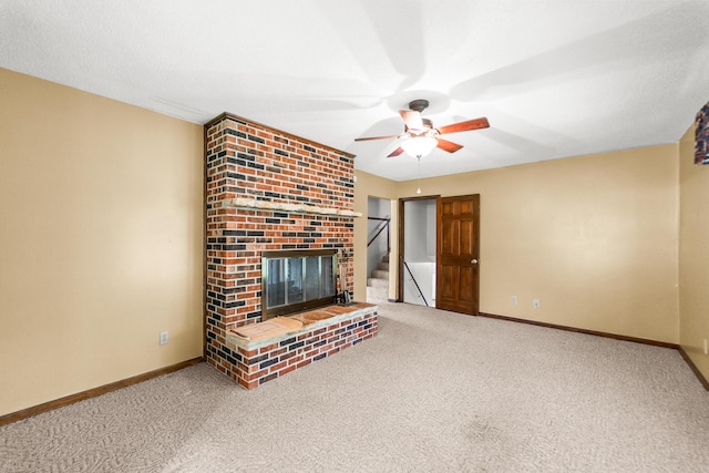 4 Halley Ct, Fulton, MO 65251 - unfurnished living room with ceiling fan, carpet floors, baseboards, and a fireplace