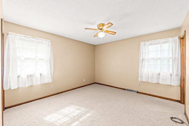 4 Halley Ct, Fulton, MO 65251 - unfurnished room featuring a ceiling fan, carpet floors, and baseboards