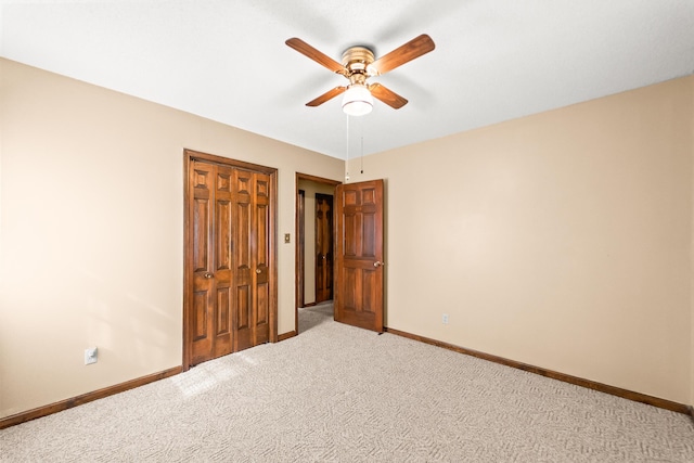 4 Halley Ct, Fulton, MO 65251 - unfurnished bedroom featuring light carpet, a closet, baseboards, and a ceiling fan