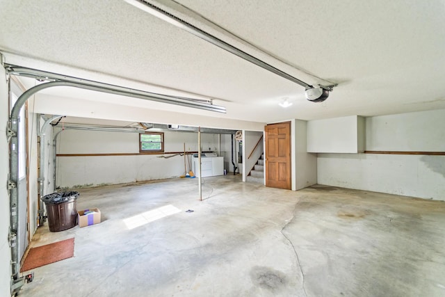 4 Halley Ct, Fulton, MO 65251 - garage featuring washer / dryer and a garage door opener