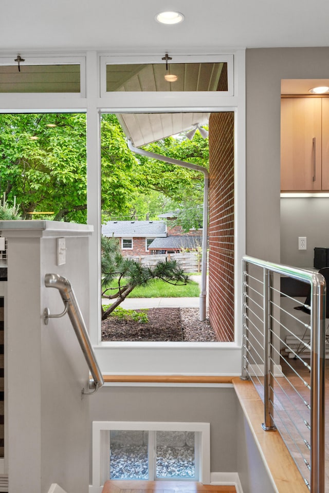 doorway to outside with recessed lighting