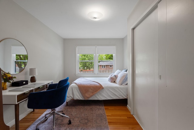 bedroom with light wood-style flooring