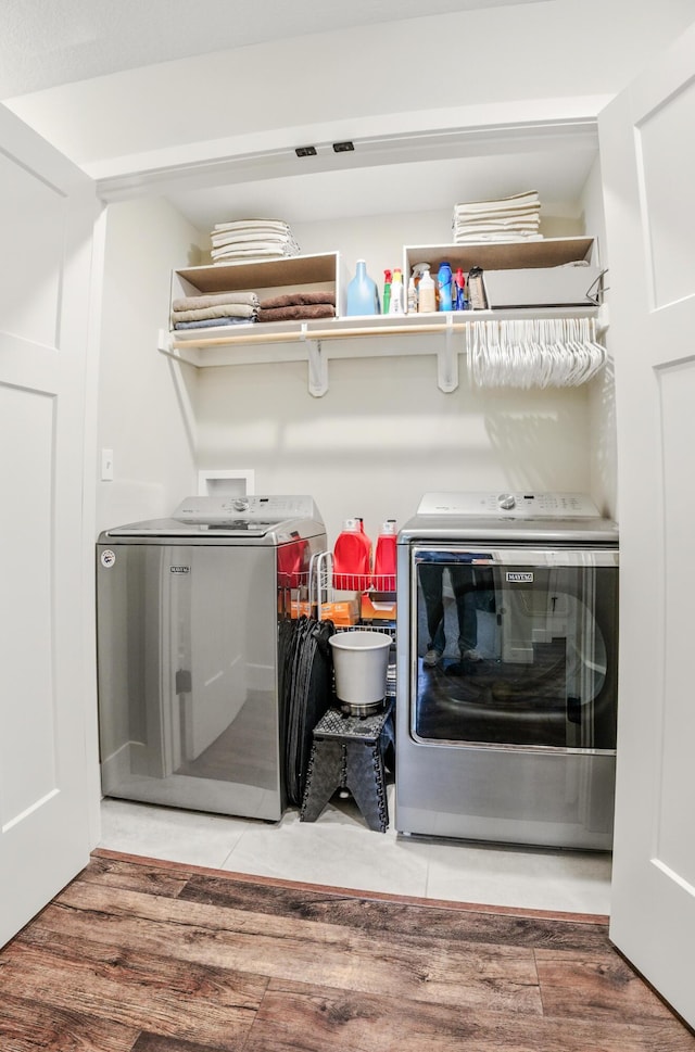 washroom featuring independent washer and dryer