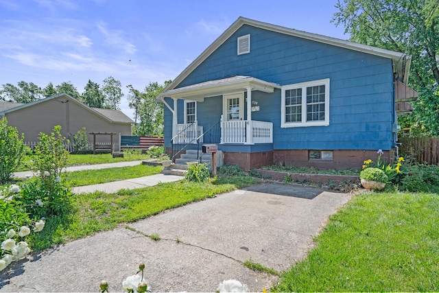 view of front of home featuring covered porch